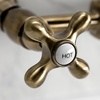 image:imageKingston Brass KS1240AX Heritage 8 in Center Kitchen Bridge Faucet 9716 in Spout Reach Matte BlackAntique Brass