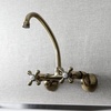 image:imageKingston Brass Kingston 6Inch Adjustable Center Wall Mount Kitchen Faucet Brushed BrassAntique Brass