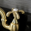 image:imageKingston Brass KS7973TX French Country Bridge Bathroom Faucet with Brass PopUp Antique BrassBrushed Brass